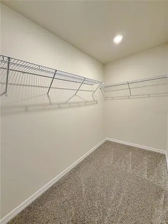 a view of a room with racks on the wall