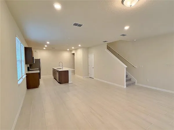a view of a kitchen with a sink