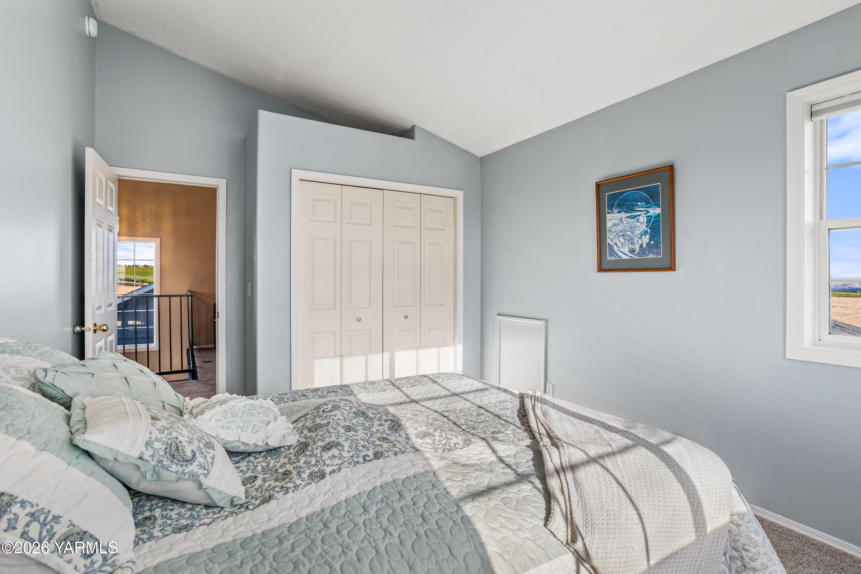 5060 Lombard Loop Road Zillah, WA 98953 - Photo 41 of 65 a bedroom with a bed and a window