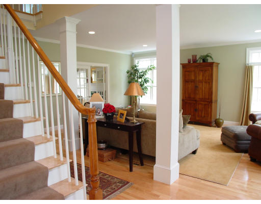 24 Hunter Lane/fire Road Lancaster, MA 01523 - Photo 3 of 7 a view of a livingroom with furniture and stairs