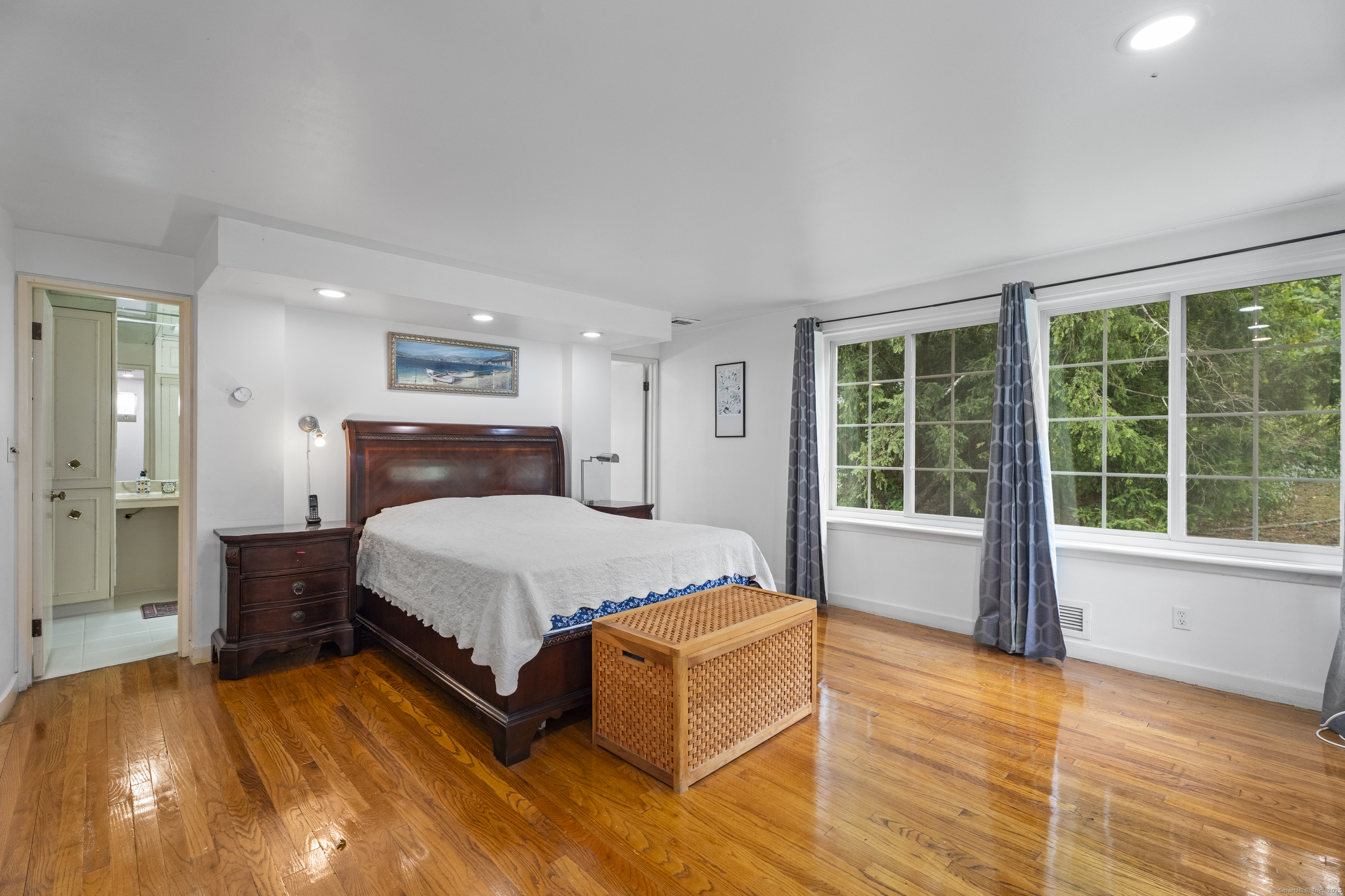 46 Tumblebrook Road Woodbridge, CT 06525 - Photo 18 of 37 Large primary bedroom with a fireplace