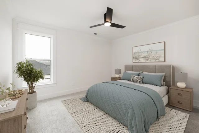 a backyard of a house with wooden fence and a lawn chairs