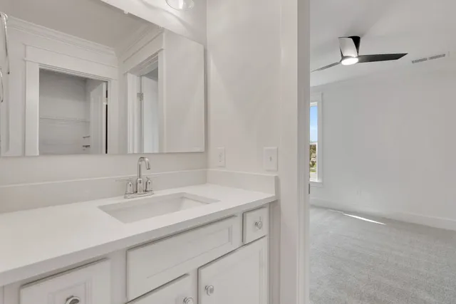 an aerial view of residential house with outdoor space and swimming pool