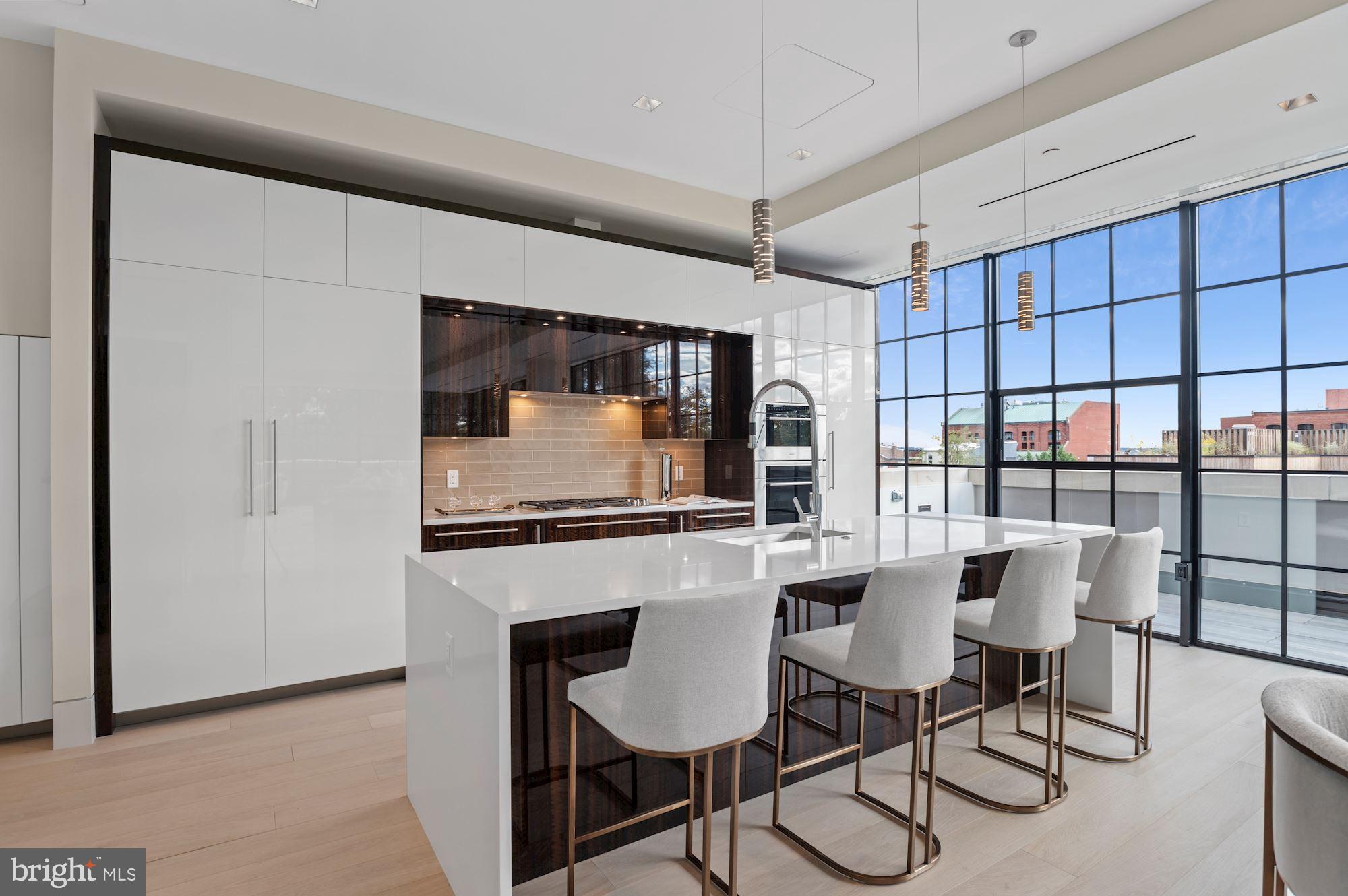 3255 Prospect Street Northwest, Unit PH5 Washington, DC 20007 - Photo 15 of 42 Sleek, sophisticated kitchen