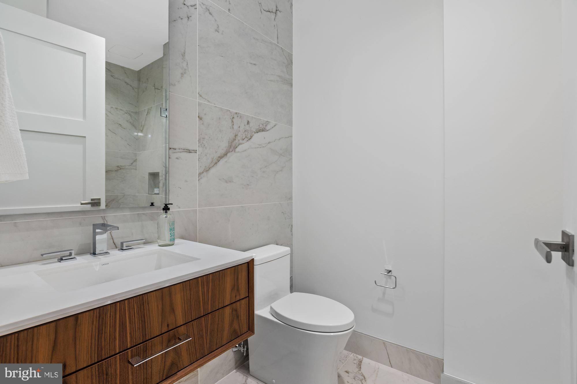 3255 Prospect Street Northwest, Unit PH5 Washington, DC 20007 - Photo 27 of 42 En suite bath in bedroom three