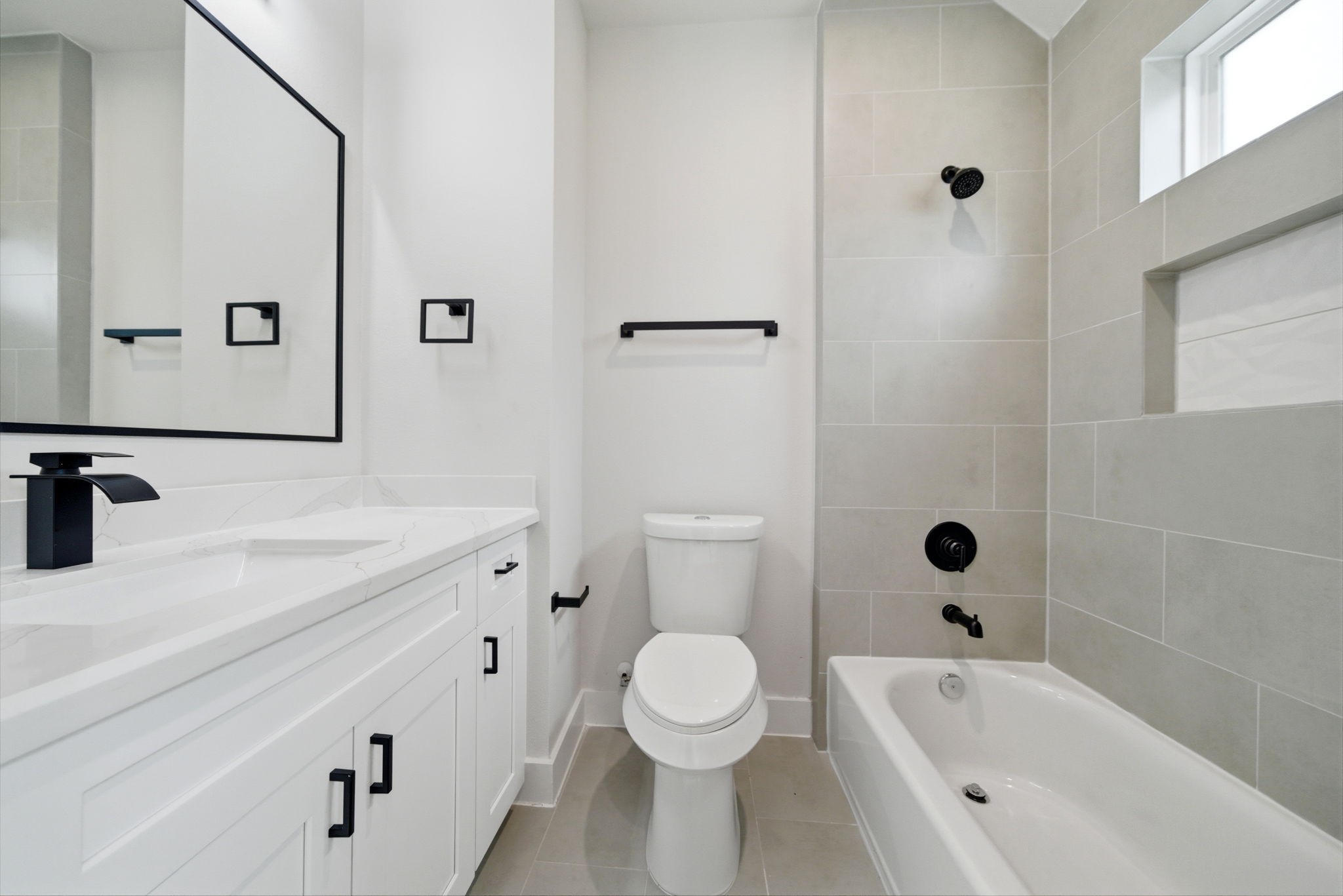 328 Janisch Road, Unit C Houston, TX 77018 - Photo 32 of 46 a bathroom with a sink a toilet and shower