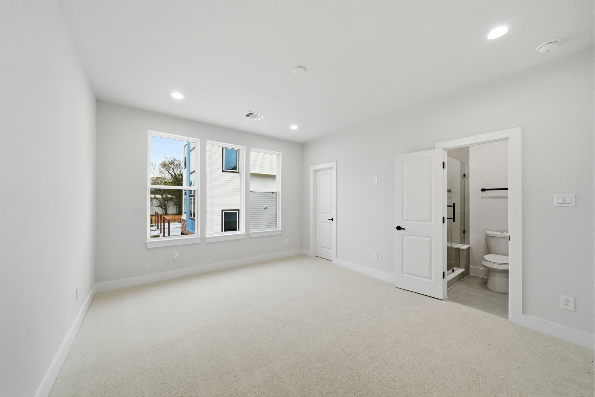 328 Janisch Road, Unit C Houston, TX 77018 - Photo 36 of 46 a view of empty room with a window and fireplace