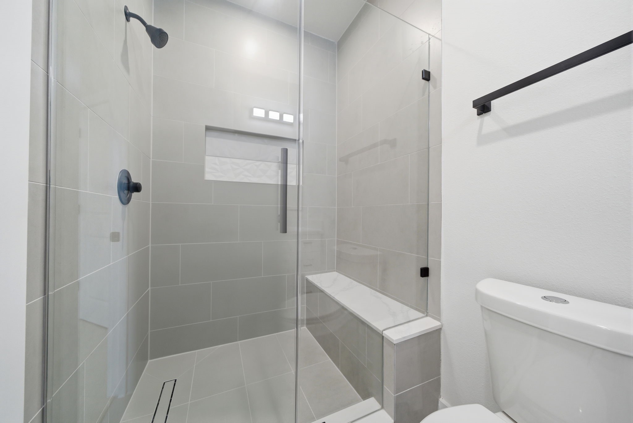 328 Janisch Road, Unit C Houston, TX 77018 - Photo 37 of 46 a bathroom with a shower a toilet and sink