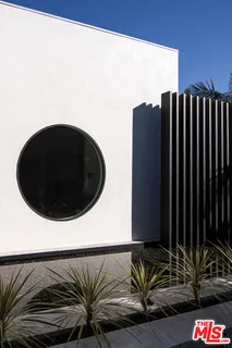 a view of balcony with furniture