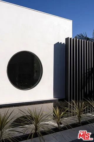 a view of balcony with furniture