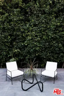 a view from deck having patio