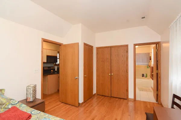 a view of a bedroom with closet area