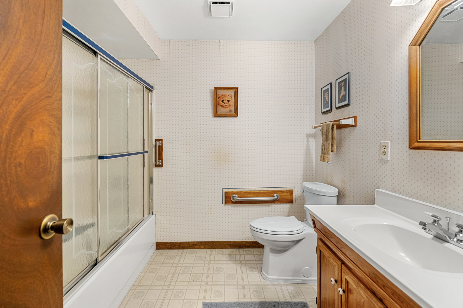 10901 Gasch Road Harvard, IL 60033 - Photo 12 of 46 a bathroom with a sink a toilet and a shower