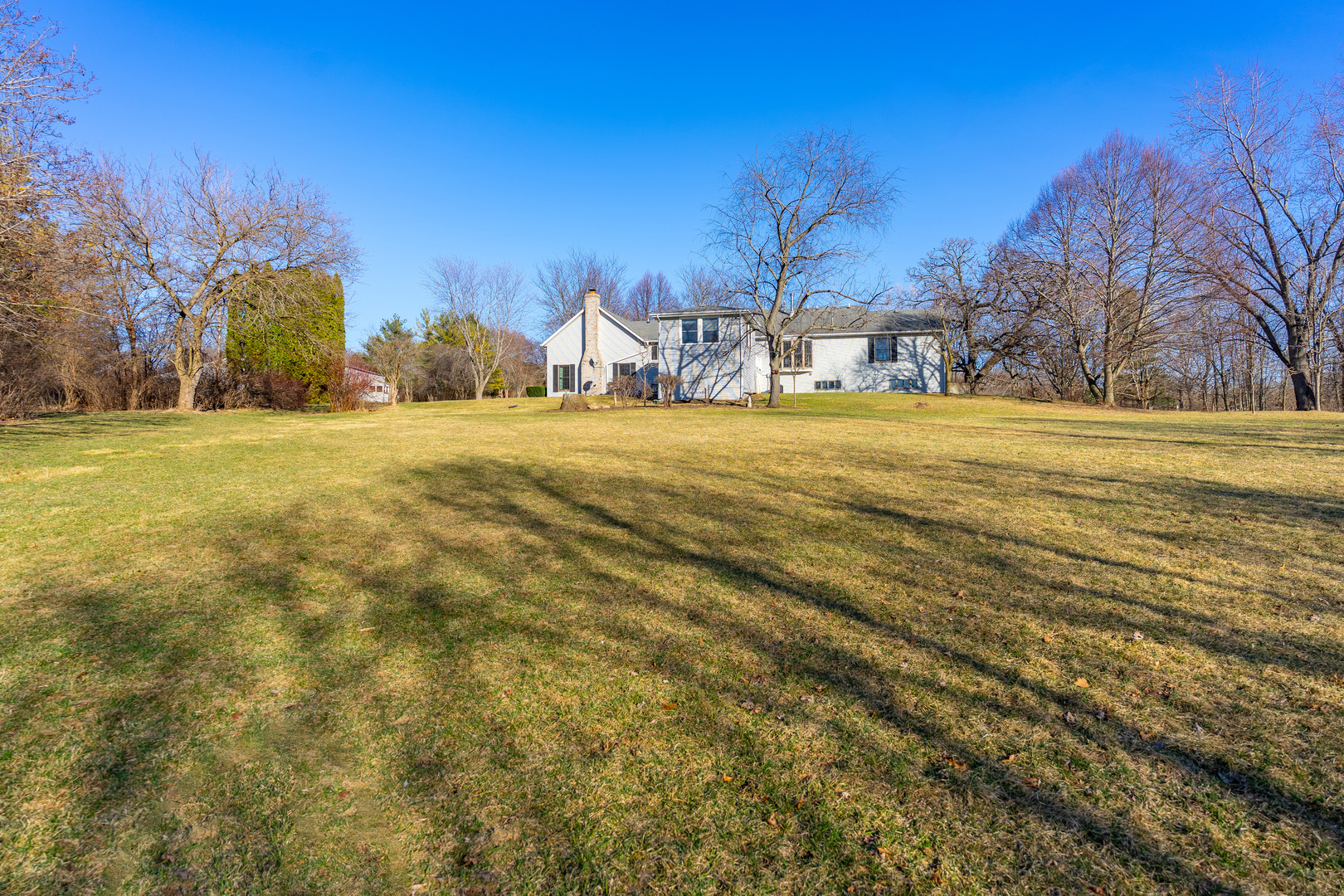 10901 Gasch Road Harvard, IL 60033 - Photo 39 of 46 a view of a large building with large trees