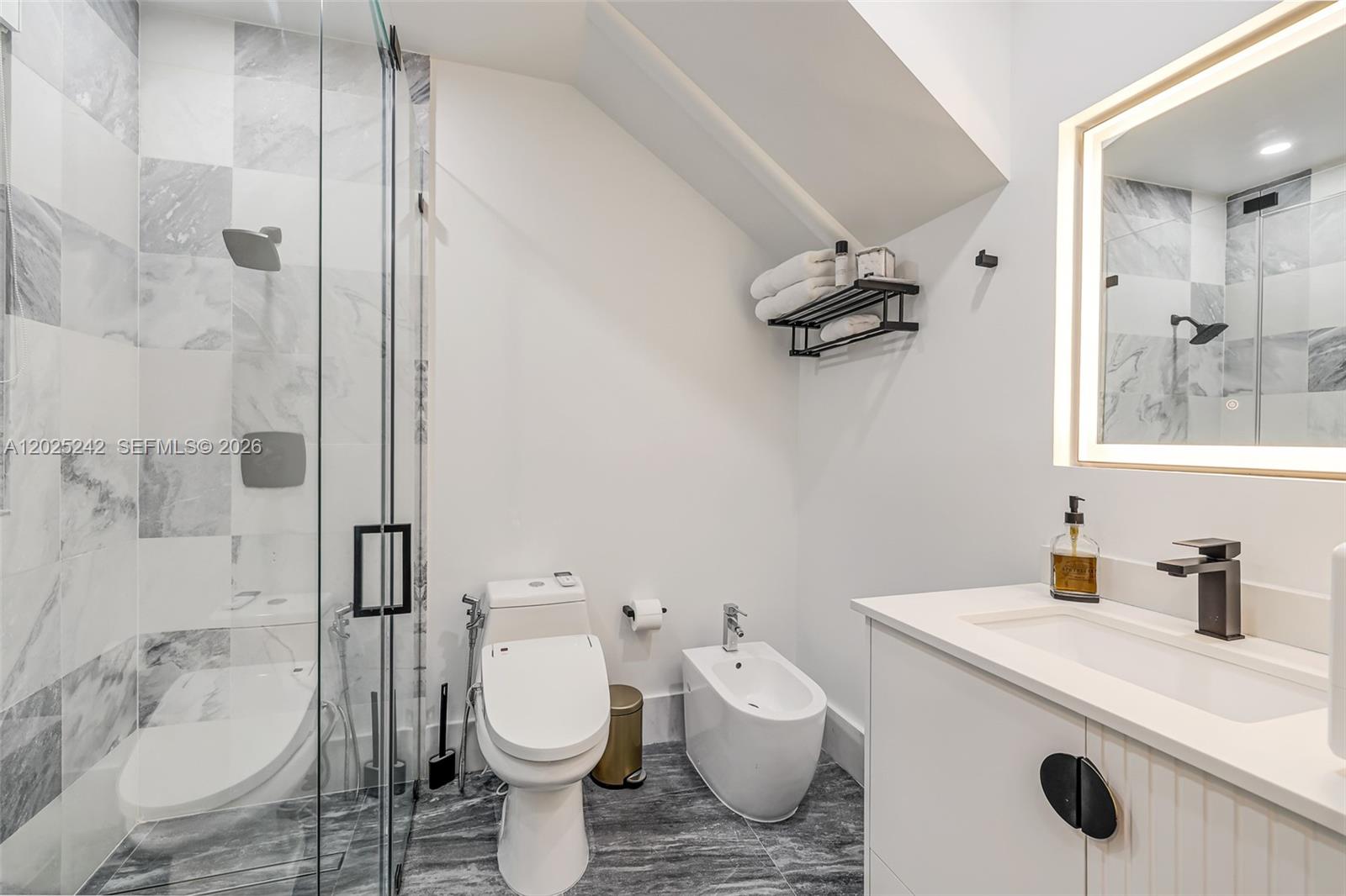 8761 Southwest 56th Street Miami, FL 33165 - Photo 34 of 90 a bathroom with a sink toilet and shower