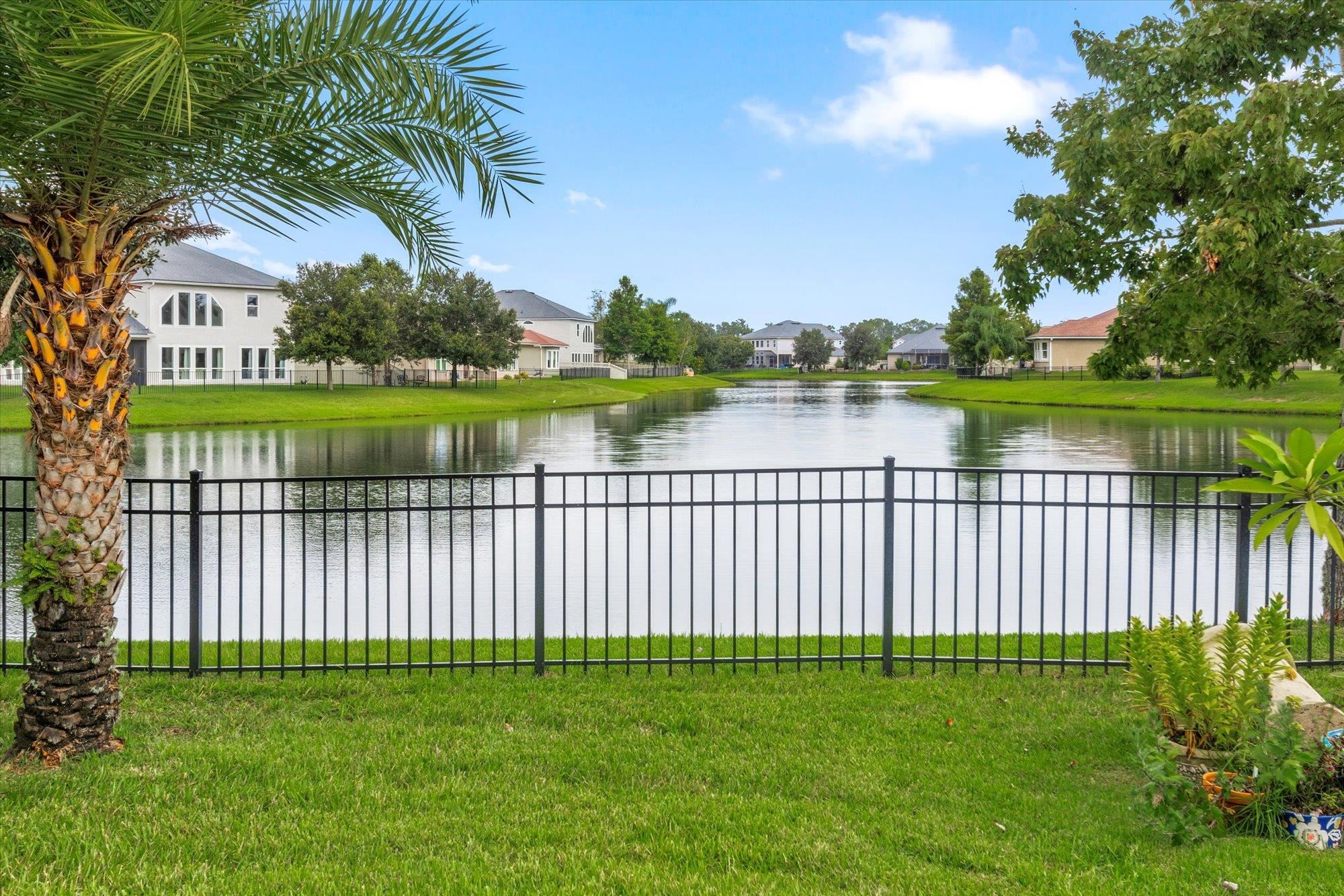 256 Vivian James Drive St. Augustine, FL 32092 - Photo 12 of 57 a view of lake with a yard