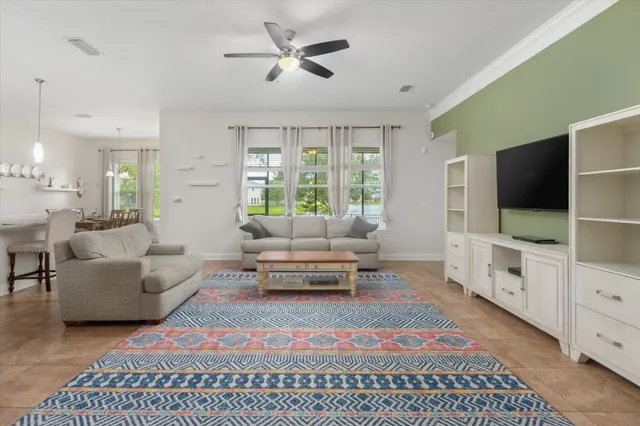 a living room with furniture and a couch