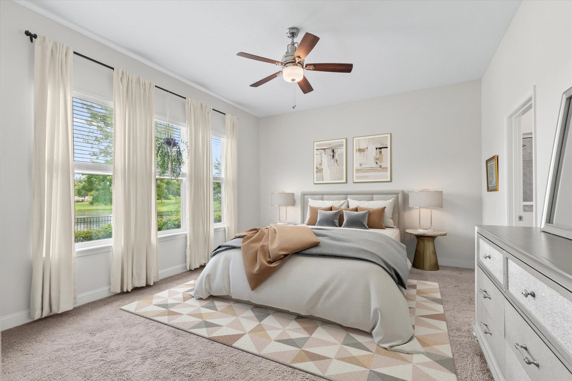 256 Vivian James Drive St. Augustine, FL 32092 - Photo 23 of 57 a bedroom with a large bed and a window