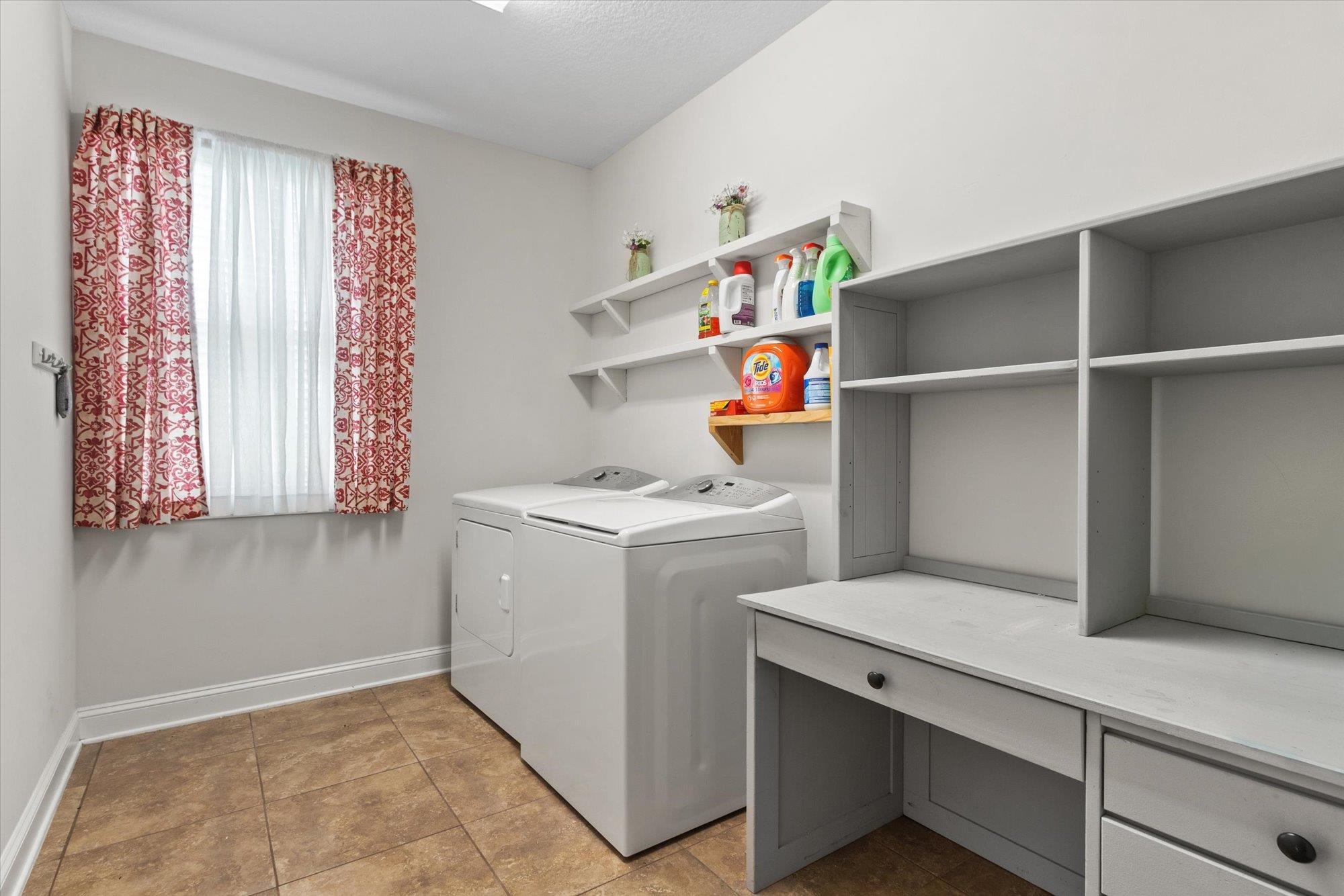 256 Vivian James Drive St. Augustine, FL 32092 - Photo 39 of 57 a utility room with dryer and washer