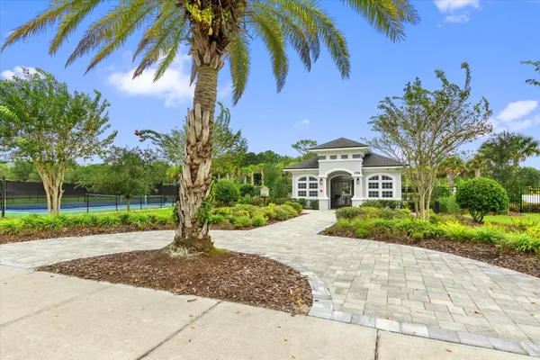 a view of an outdoor space and tennis court