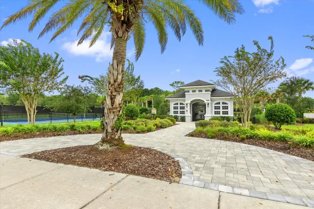 a view of an outdoor space and tennis court