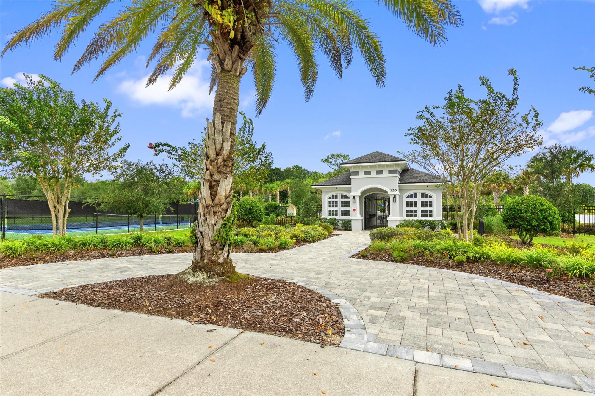 256 Vivian James Drive St. Augustine, FL 32092 - Photo 41 of 57 a front view of a house with garden