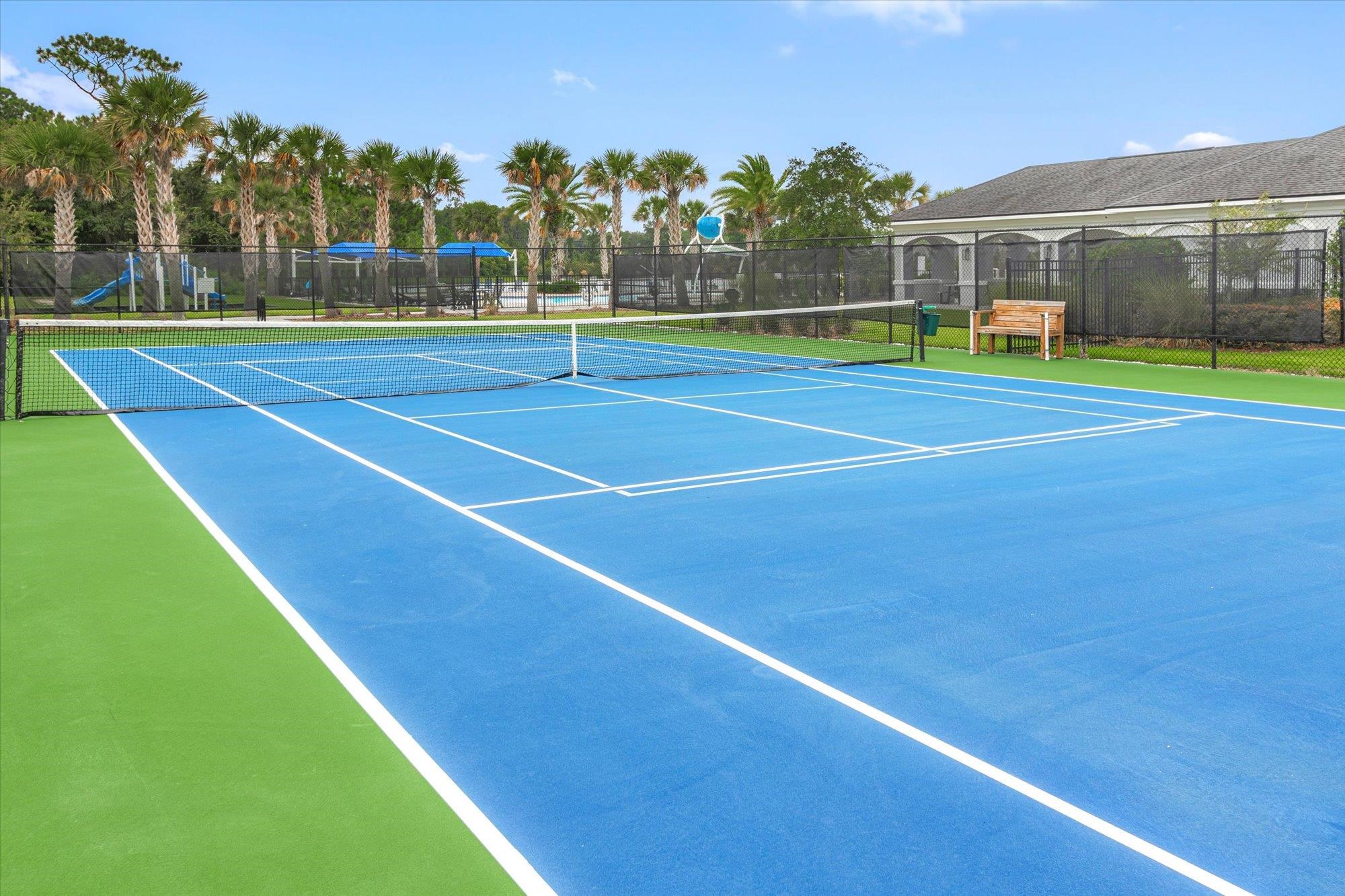 256 Vivian James Drive St. Augustine, FL 32092 - Photo 45 of 57 a view of an outdoor space and tennis court