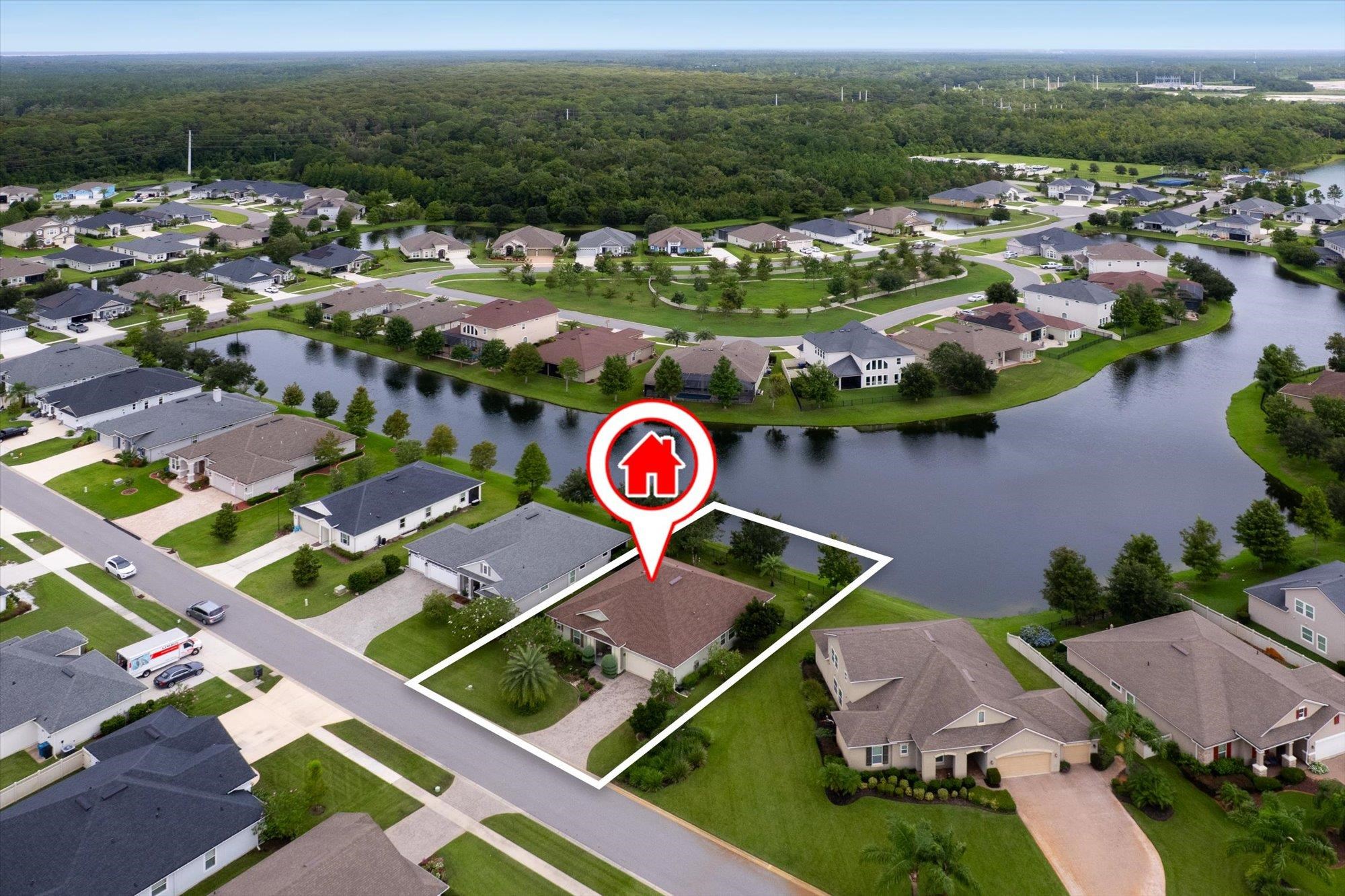 256 Vivian James Drive St. Augustine, FL 32092 - Photo 57 of 57 an aerial view of residential houses with outdoor space