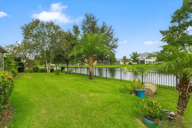 a view of a chair and table and chairs in the patio