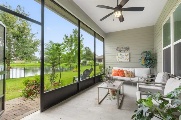 a outdoor space with patio the couches and a dining table with garden view