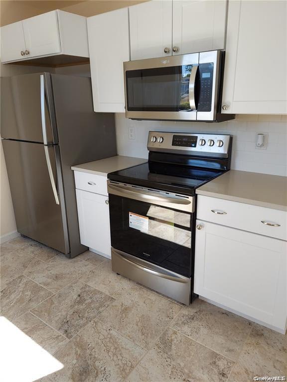 50 Pulaski Road Kings Park, NY 11754 - Photo 2 of 9 First floor kitchen newly renovated