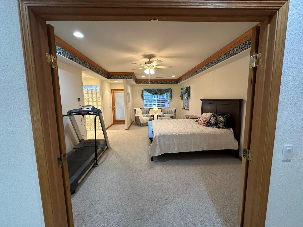 9130 Quail Lake Court Loomis, CA 95650 - Photo 16 of 31 a bedroom with furniture and a window