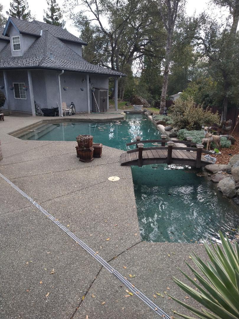 9130 Quail Lake Court Loomis, CA 95650 - Photo 26 of 31 a front view of a house with garden