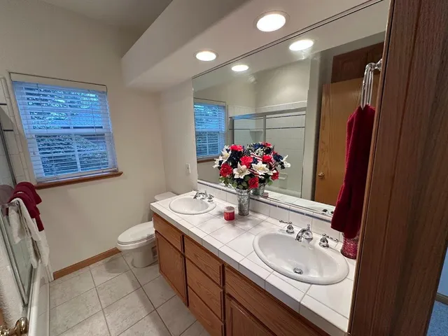 a room with a bed and furniture