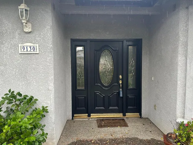 a view of a hallway with entryway