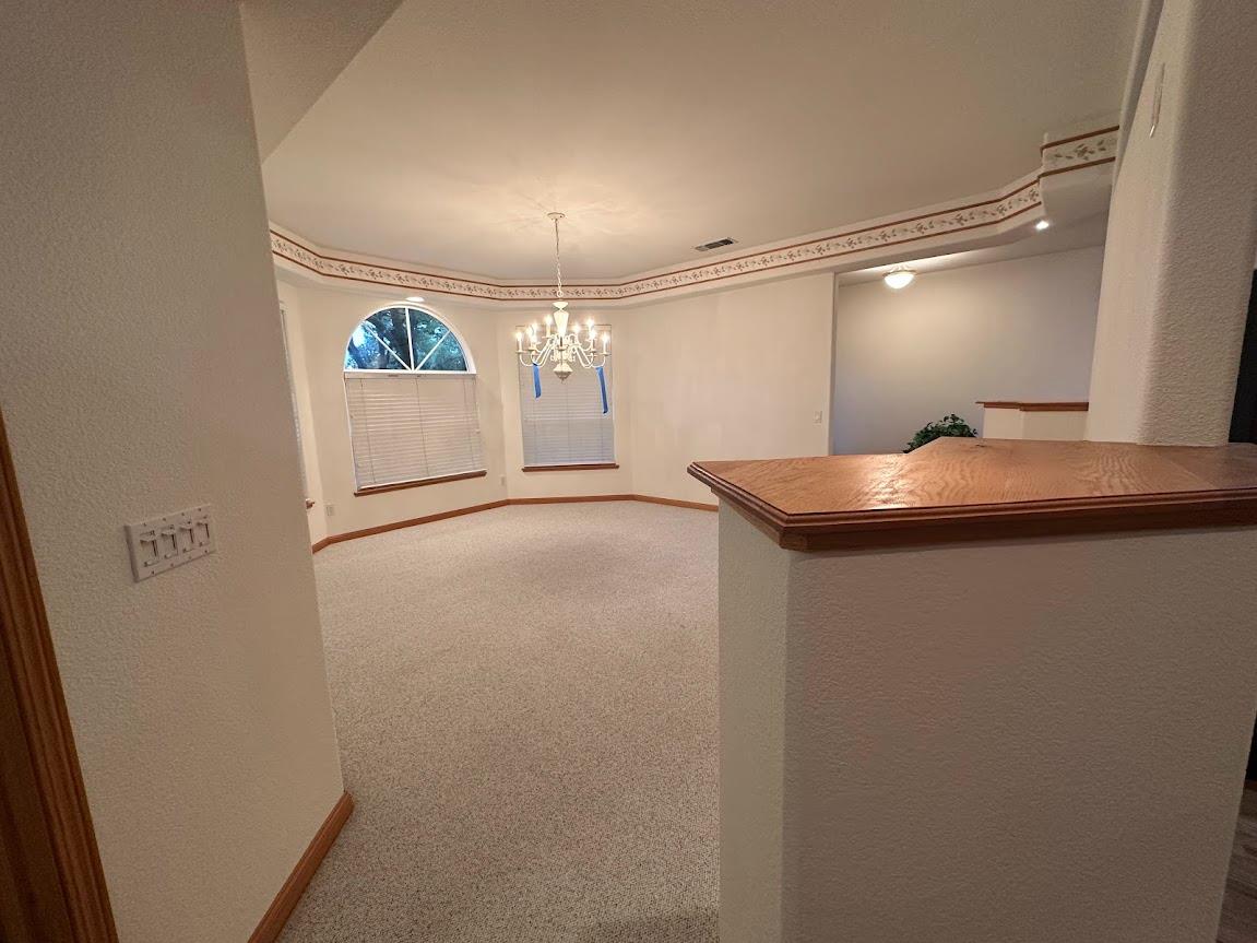 9130 Quail Lake Court Loomis, CA 95650 - Photo 6 of 31 a view of a room with wooden floor