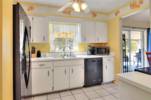a kitchen with a stove and a sink