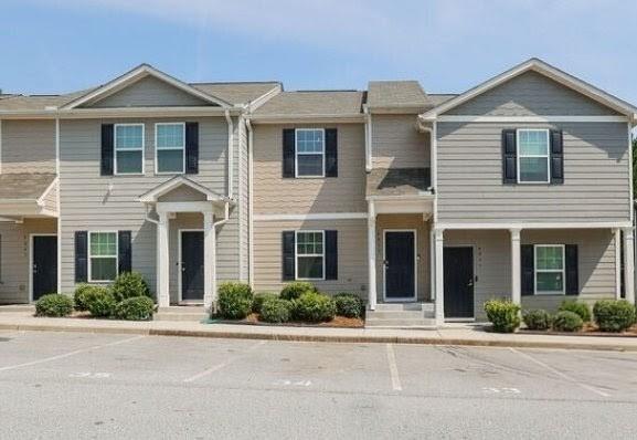 4039 Avalon Road Southwest Atlanta, GA 30331 - Photo 8 of 11 front view of a house with a yard