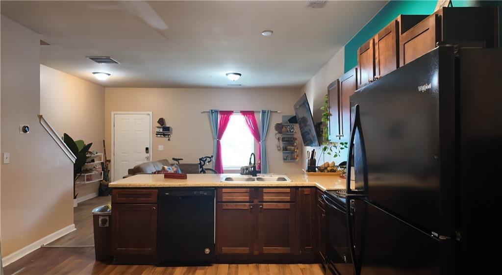 4039 Avalon Road Southwest Atlanta, GA 30331 - Photo 9 of 11 a bathroom with a sink a mirror and a shower