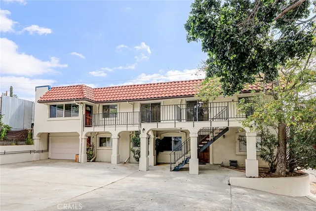 a kitchen that has a cabinets and a stove