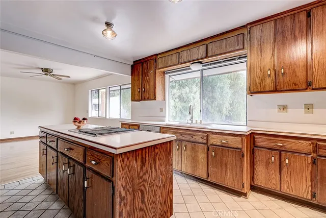 a view of wooden floor and windows in a room