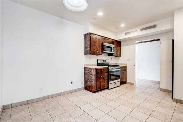 a large spacious bathroom with a large tub and sink