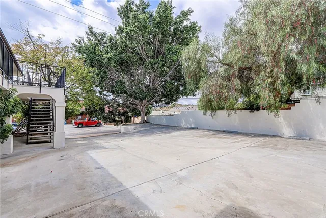 a view of an chairs and table in a room