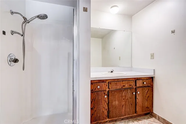 a kitchen with stainless steel appliances granite countertop a stove and a refrigerator