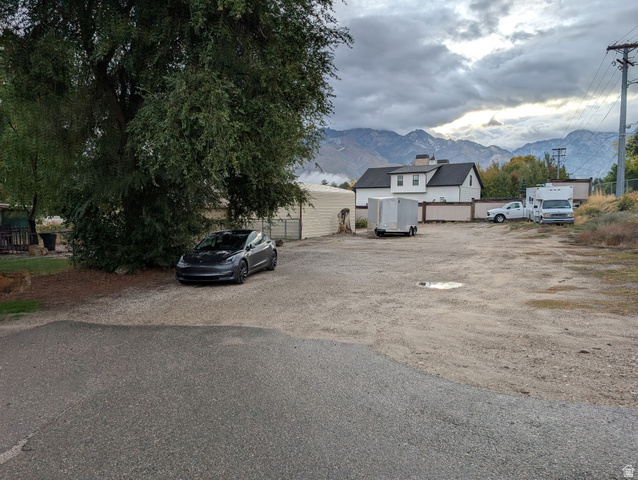 1341 East Crk Road Sandy, UT 84093 - Photo 10 of 24 View of asphalt road with a mountain view