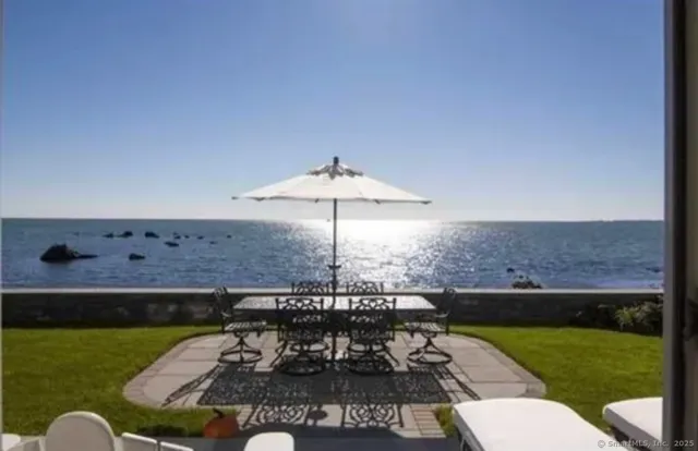 a view of a patio with furniture