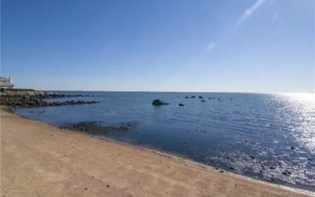 a view of beach and lake