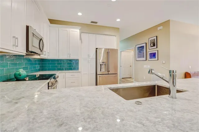 a swimming pool with view of a couch