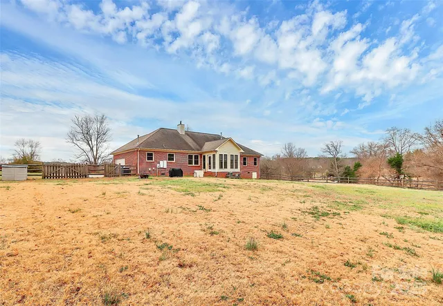 a big house with yard and pool