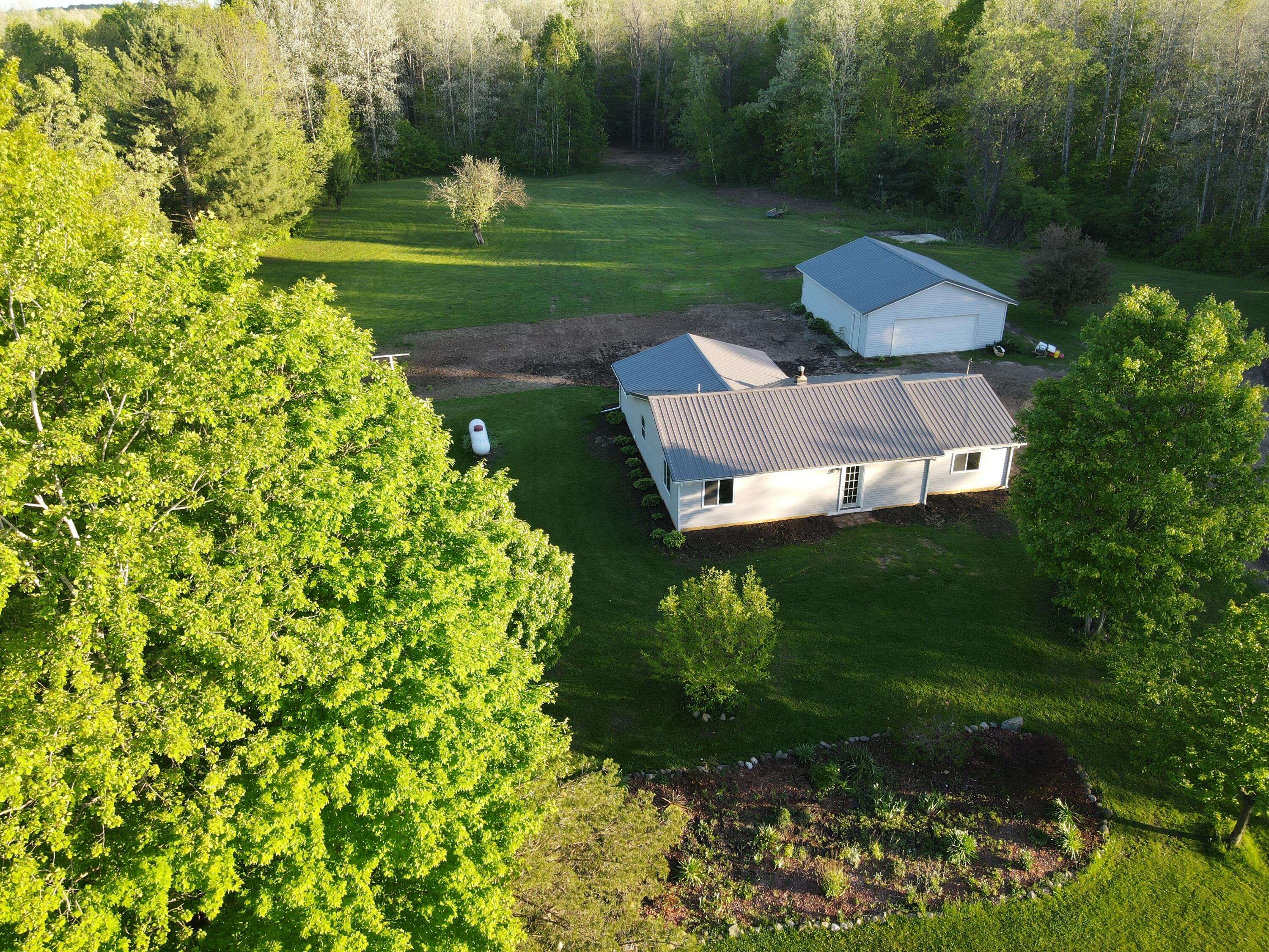 3347 15 Mile Road Marion, MI 49665 - Photo 10 of 32 sunrise g